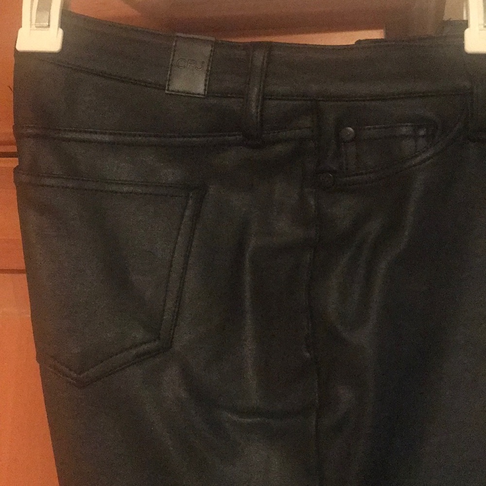 Black leather fitted pants.